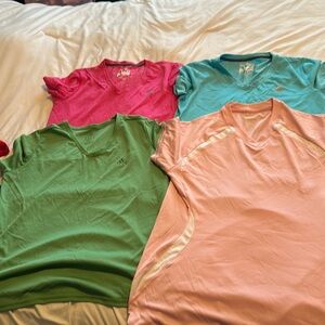 Lot of 4 M dri fit shirts for women (fuschia pink, baby pink, green and blue )